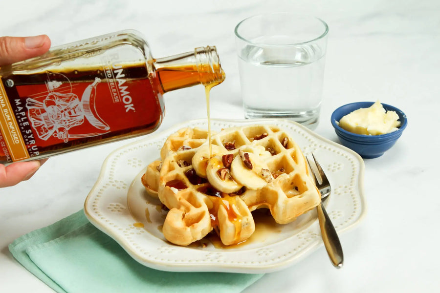 Pecan Waffles with Banana Rum Infused Maple Syrup